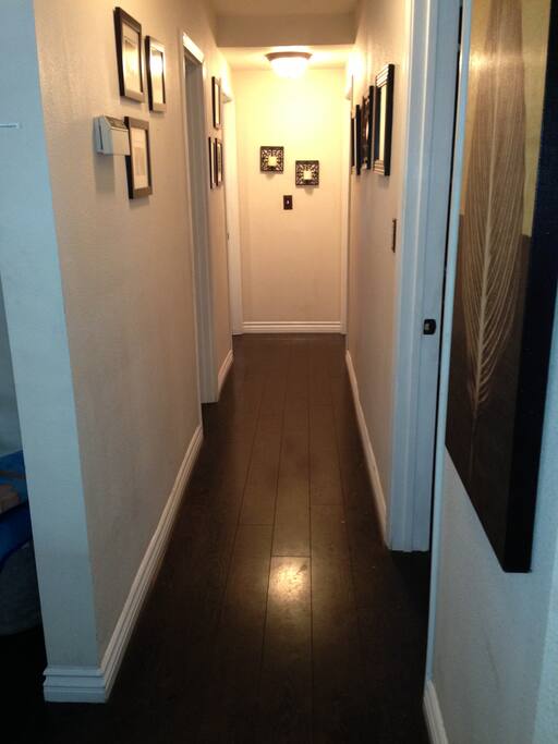 Hallway leads to bedroom