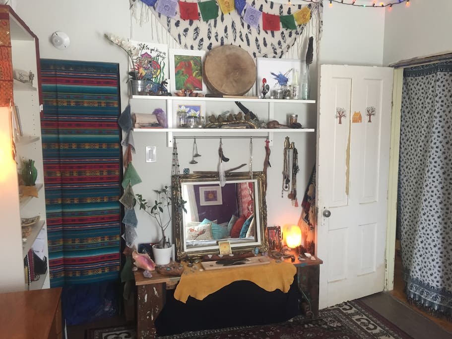 Beautiful altar space of the owner of the room. Surround yourself with medicines and sacred objects from around the world.