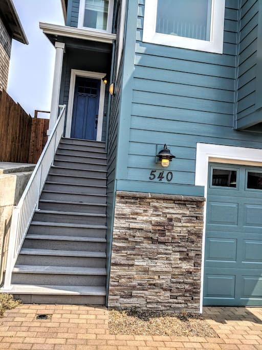 Well lit front entrance with Schlage code lock for easy and safe access