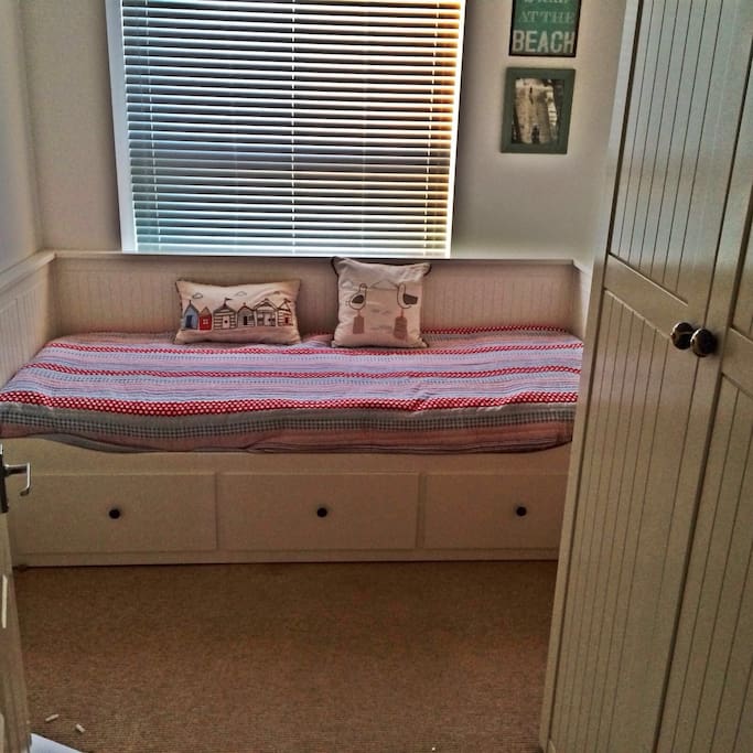 Guest room- day bed that can pull out to a comfortable double bed.