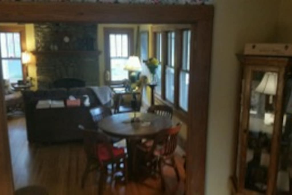 Living room - card/game table and windows that look out over the lake
