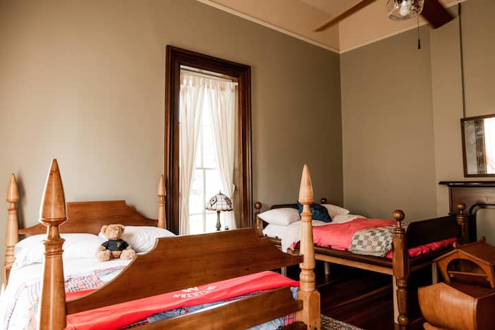 Kids' Room has two three quarter antique beds