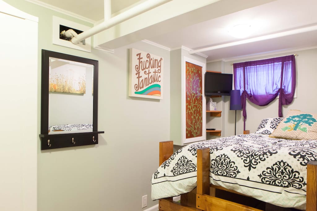 Back bedroom with XL Twin bed, full-
size wardrobe and chest of drawers.