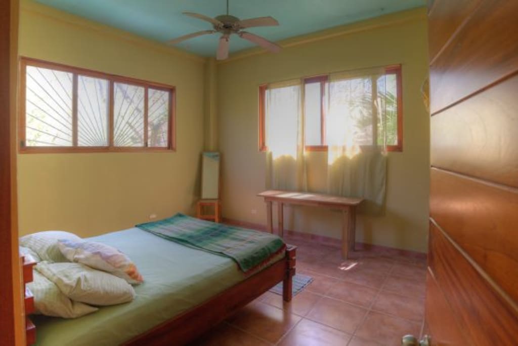 Bedroom with Queen bed, ceiling fan & AC