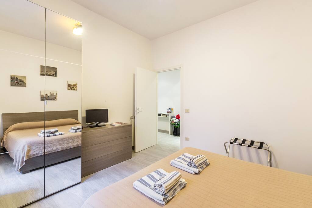 first double bedroom with memory foam mattress , wardrobe , tv and air conditioning