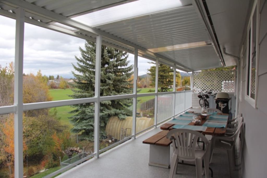 The huge upper and lower decks back directly onto a running creek and feature amazing views of the Rocky and Purcell Mountains.