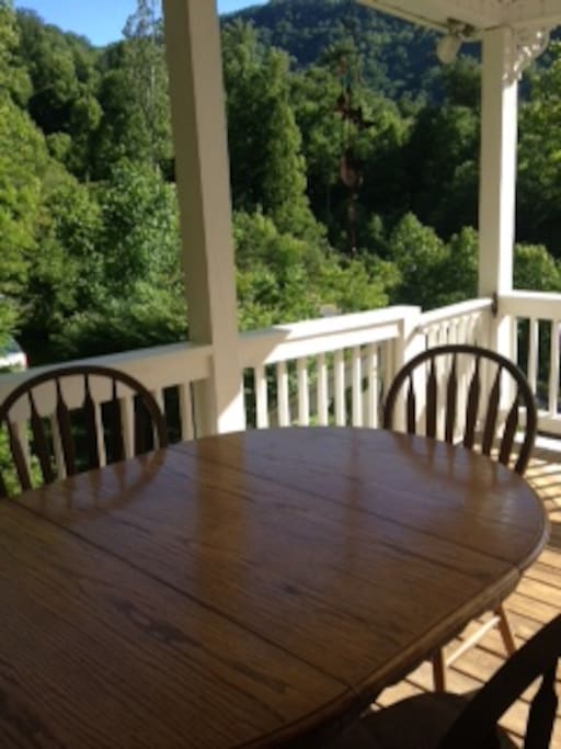 Outdoor seating for meals on the porch