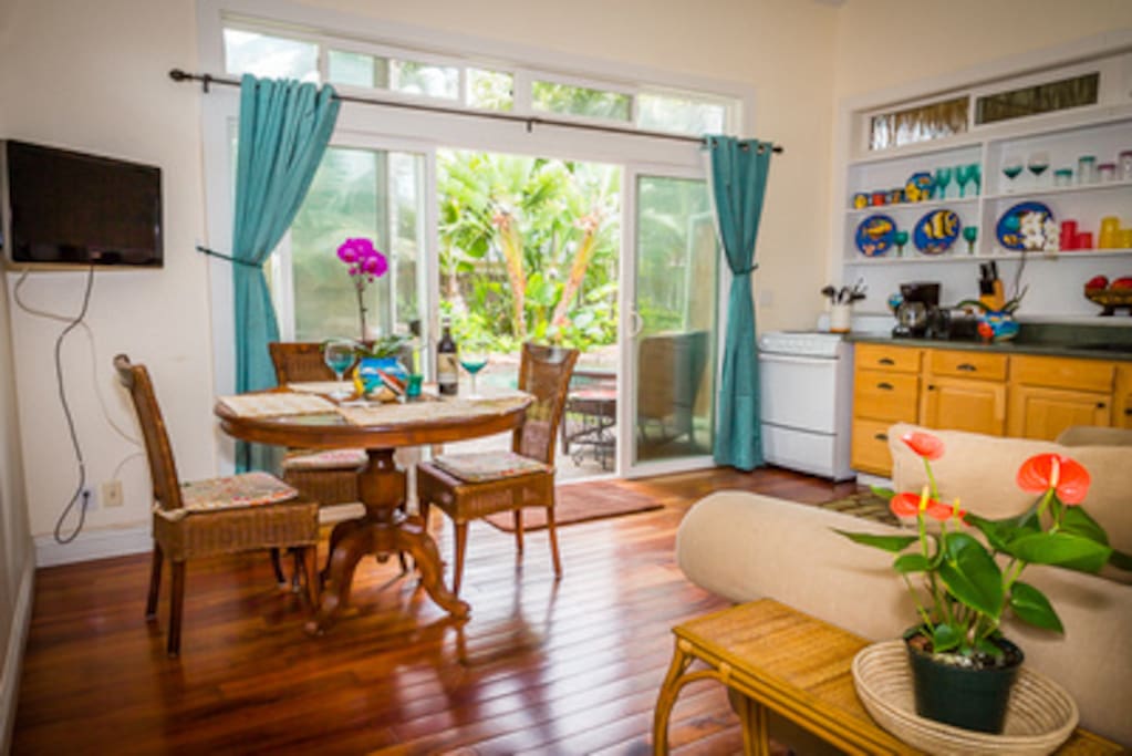 Your own private kitchen and dining area looks out over the pool.