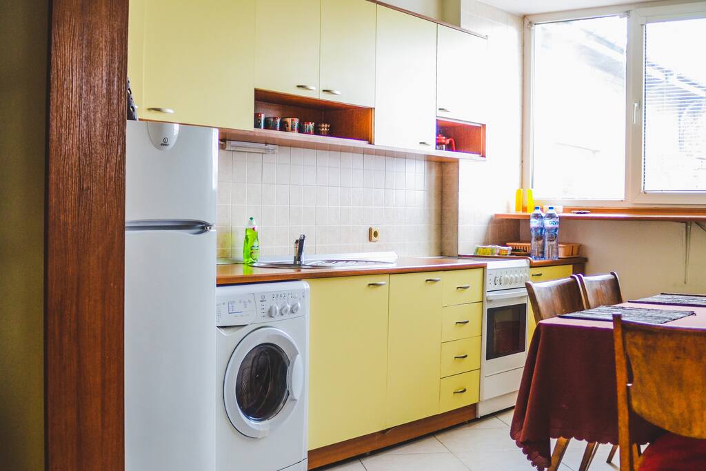 Cook a Meal in the Fully Equipped Kitchen & Dining Space.