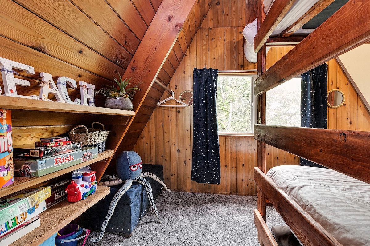 The Bunk Room has two full beds and lots of games and toys for children. 