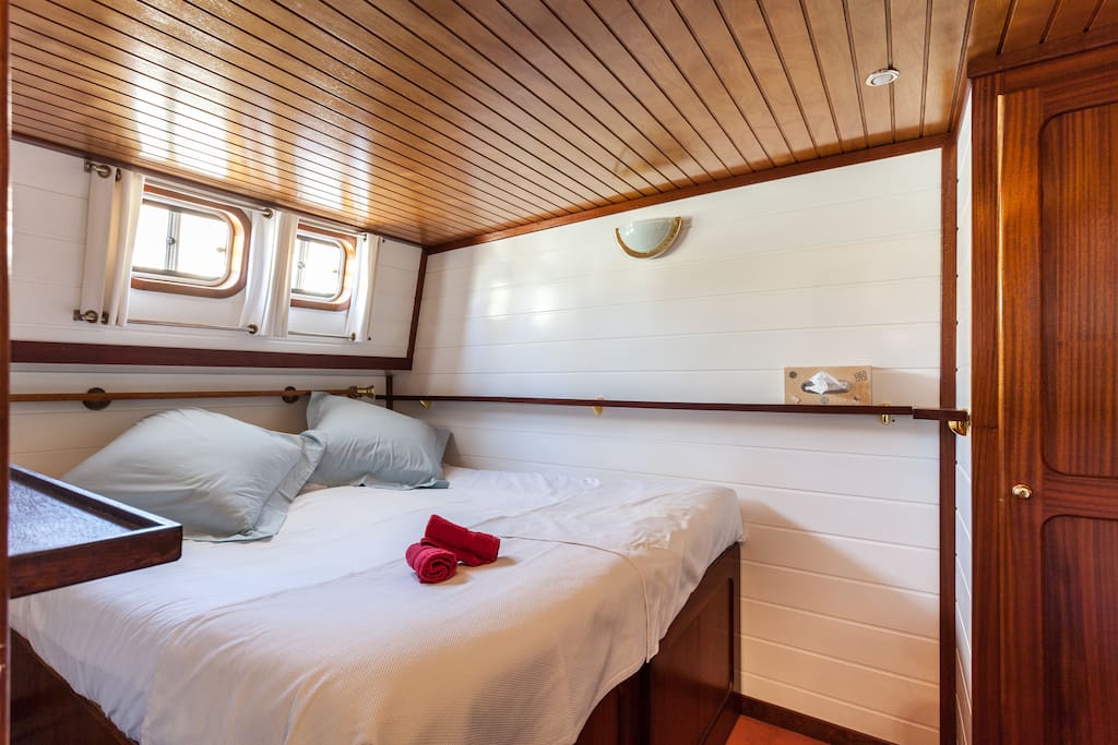 Queen bed in the bow cabin.