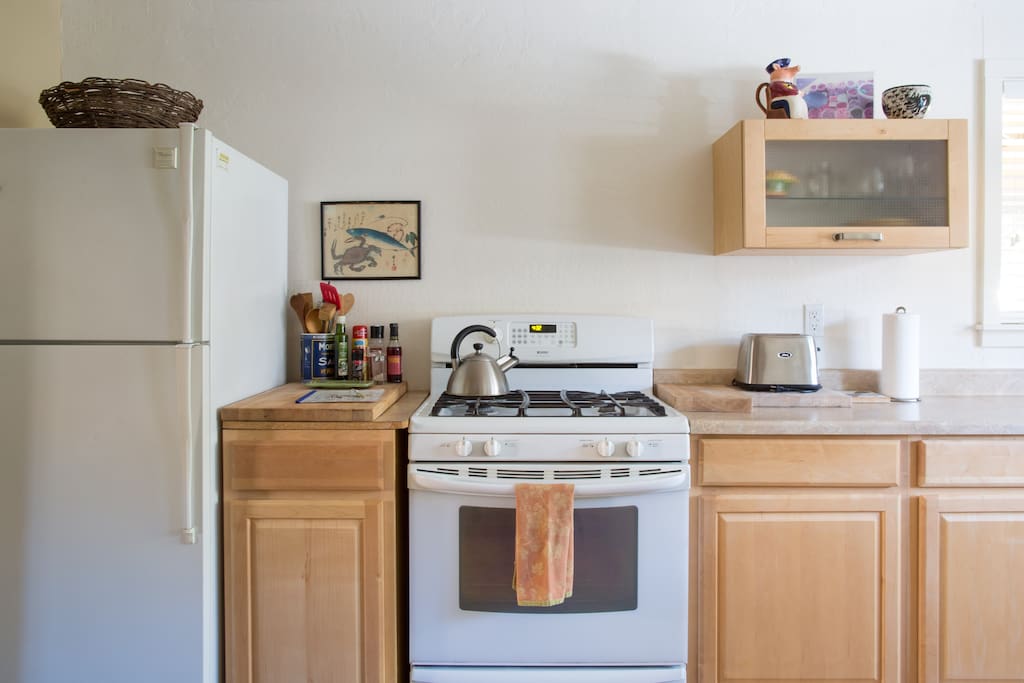 4 burner gas stove, plenty of cooking utensils.