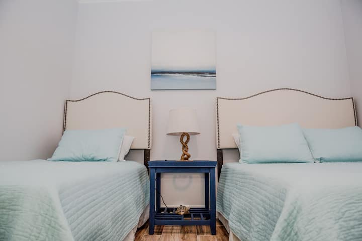 Soothing ocean hues in the second bedroom