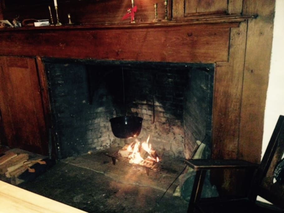 In the Dining area, I have an old working fireplace. We cook on it often.