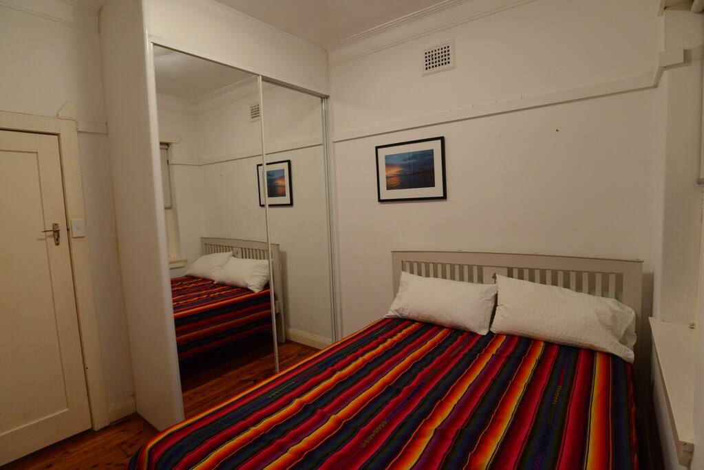 Private bedroom with comfortable queen bed.