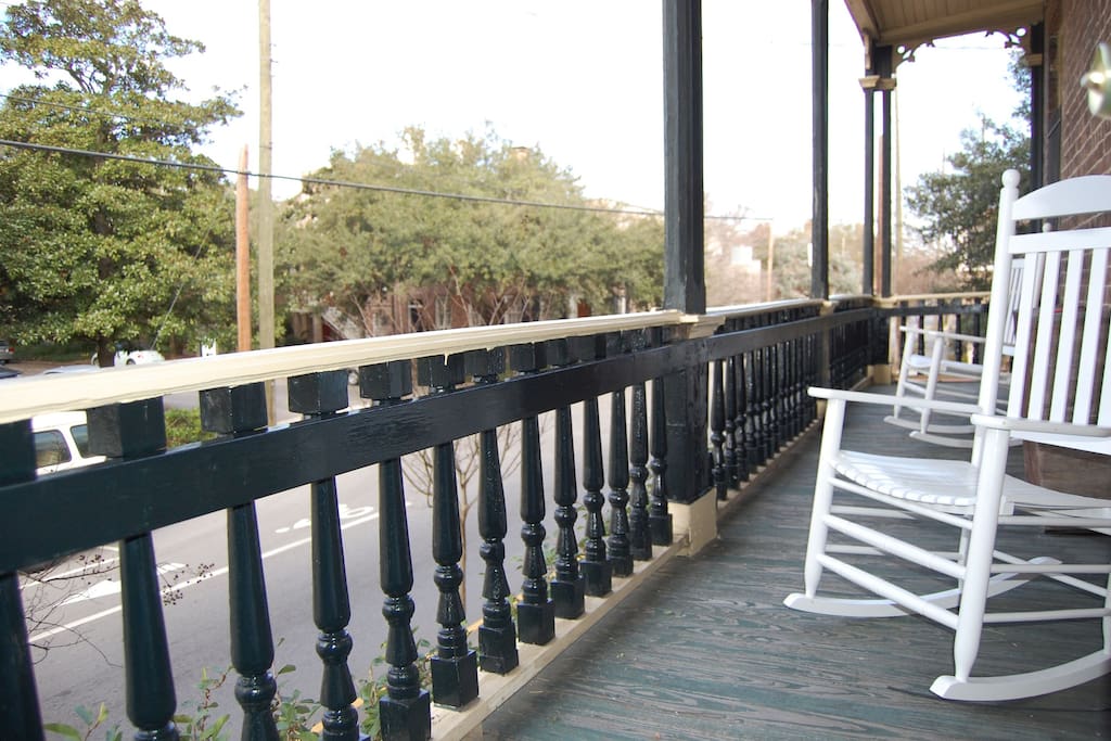 Side porch has 2 rocking chairs