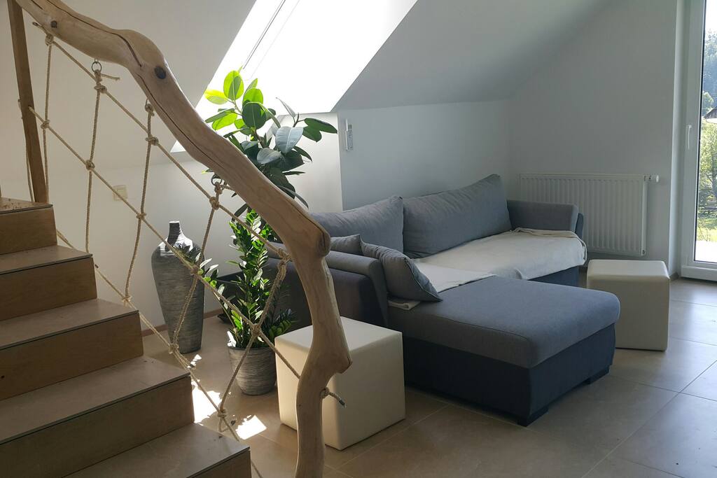Living room and stairs to the upper level