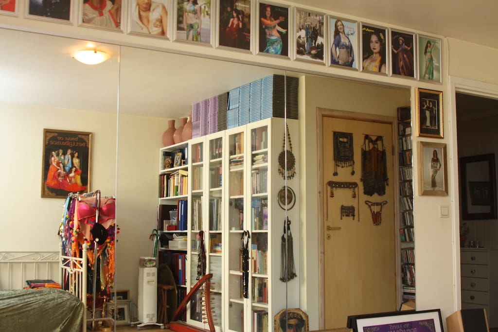 One wall is covered by mirrors.