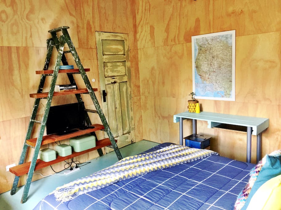 Fully enclosed and insulated room, clad with natural plywood.
