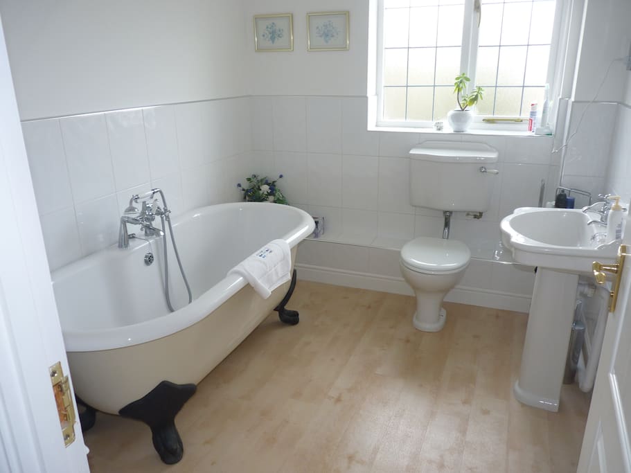 Adjoining private bathroom. Large deep bath for soaking!