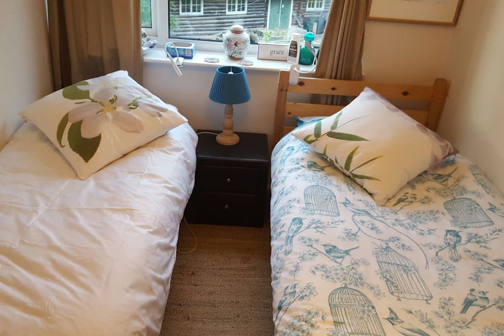 Twin beds with quality linen and towels