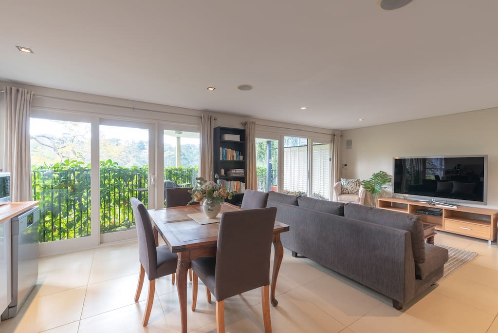 Dining and living with large cable TV