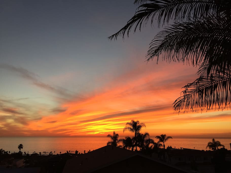 Spectacular sunset views from the deck and entire upstairs very spacious open floor plan (living room, dining room, & kitchen).