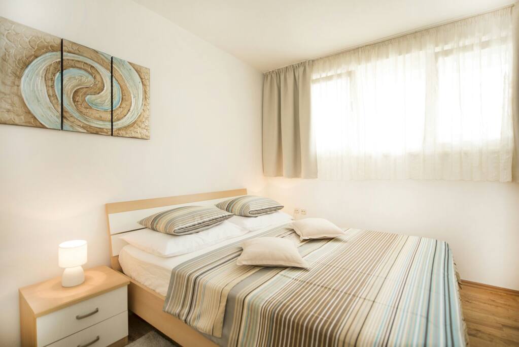 Room 1 - double bed and sofa