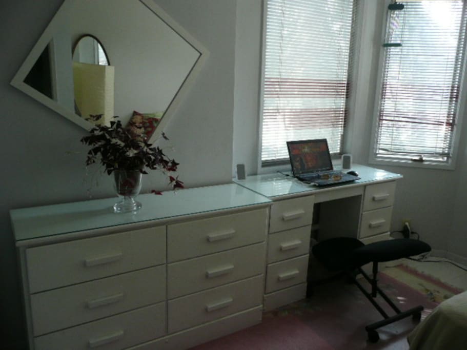 Single room with private desk area.