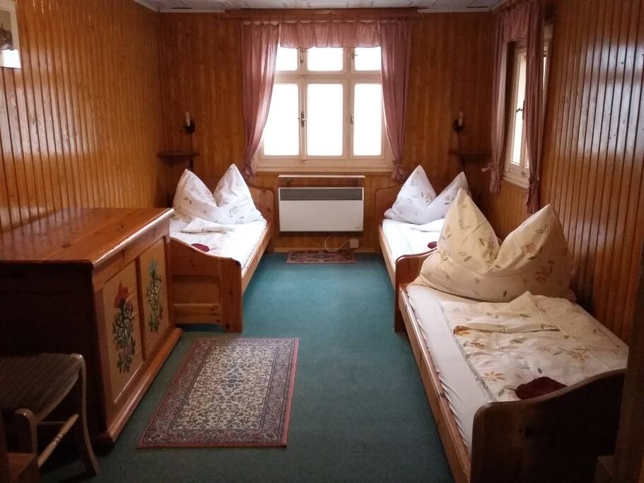 Třílůžkový pokoj