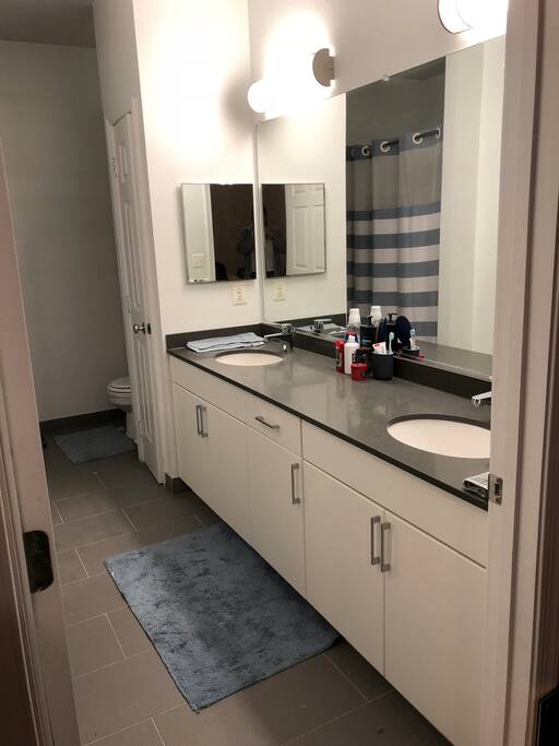 Large Private Bathroom with His & Her Sink