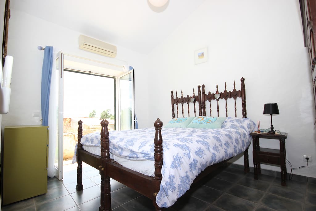 Double bedroom with french doors