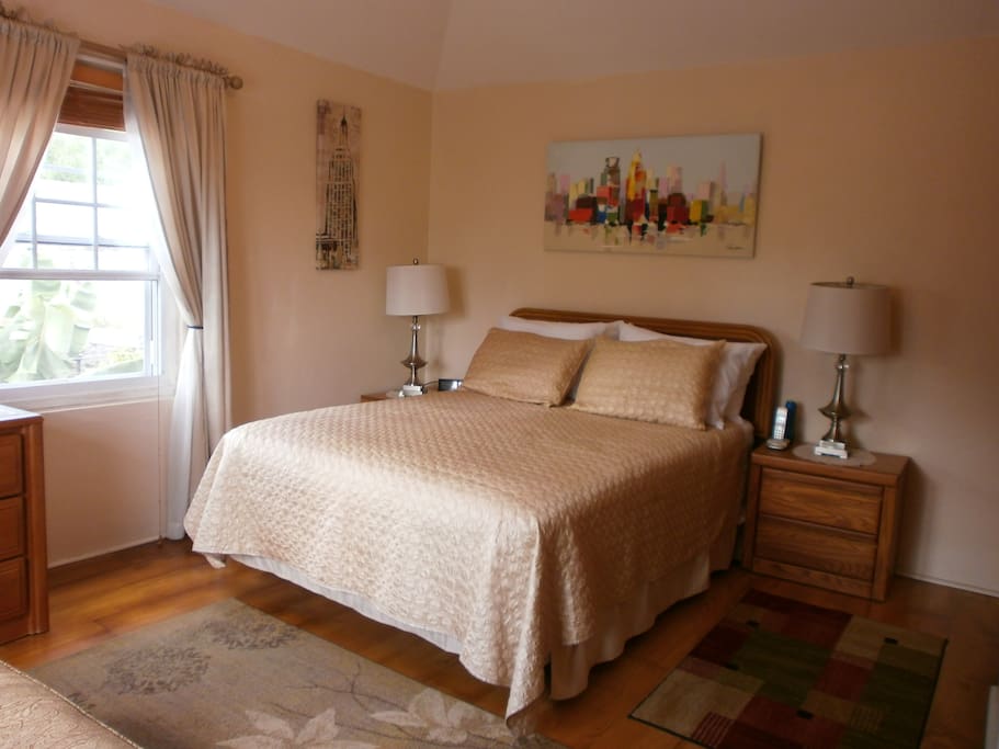 The bedroom is light and airy!