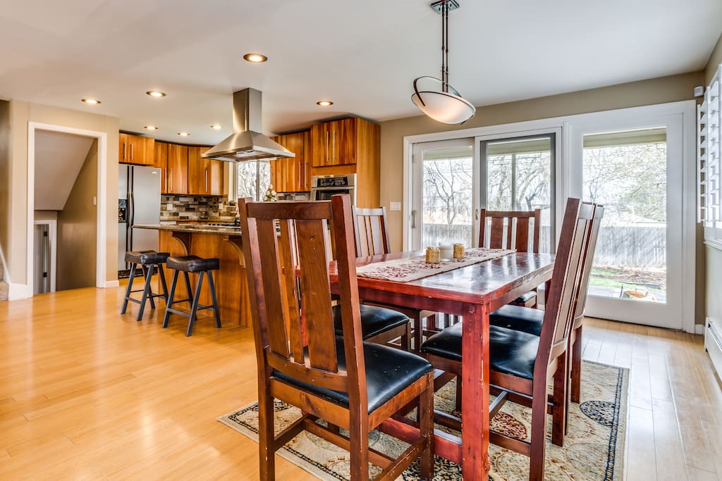We love this home! Open main floor is great for hosting large groups. There is seated inside/outside dining for 18 guests.