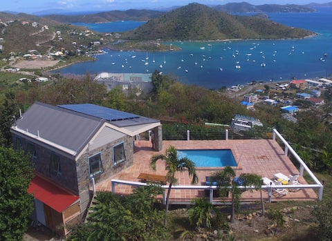 Successful Airbnb property: Stone Cottage with a pool and gorgeous view in St. John