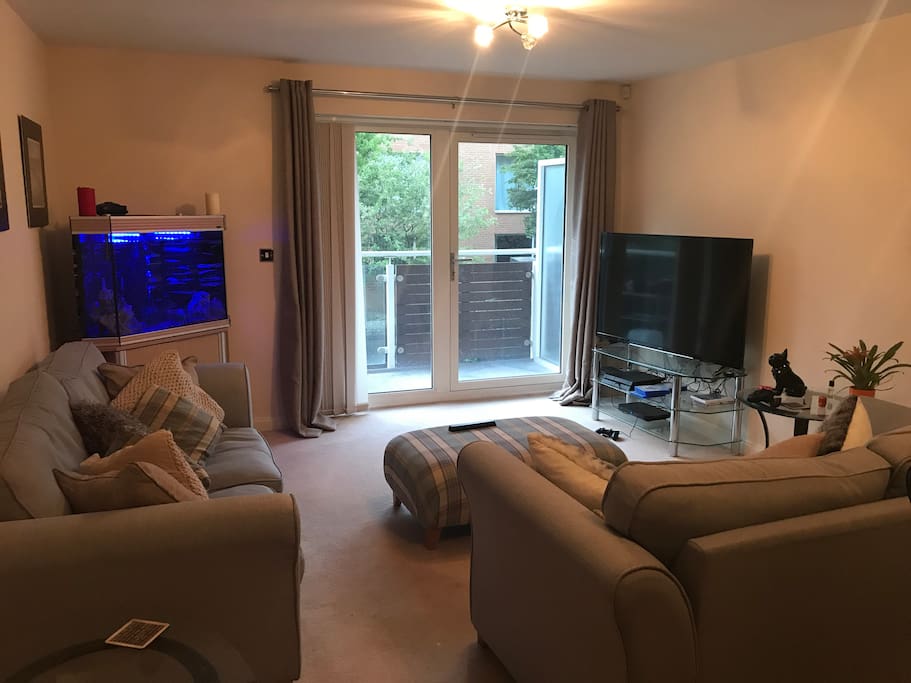 Lounge area with large double sofa bed and balcony