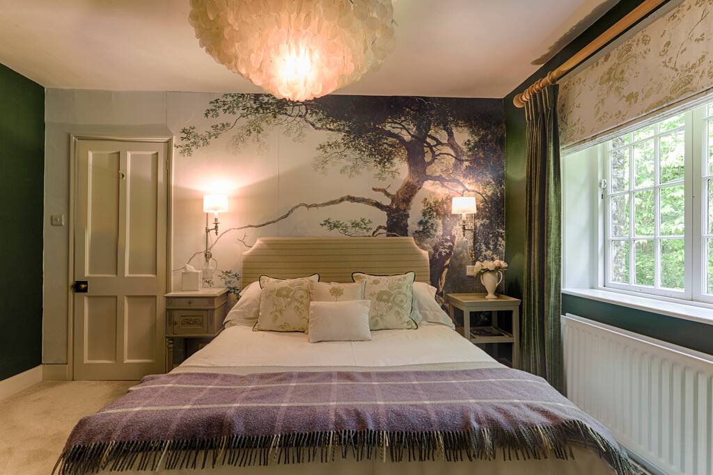 Bedroom with king size bed and en suite shower room