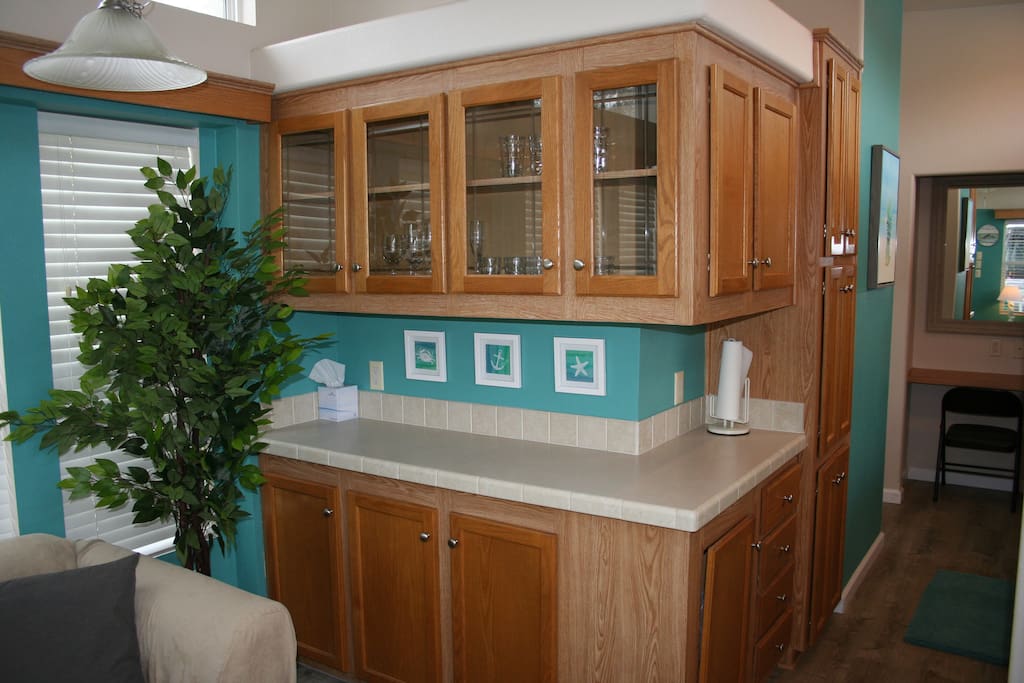 Plenty of counter space for making a meal or storing your items. Sofa also offers a good vantage point to watch tv.