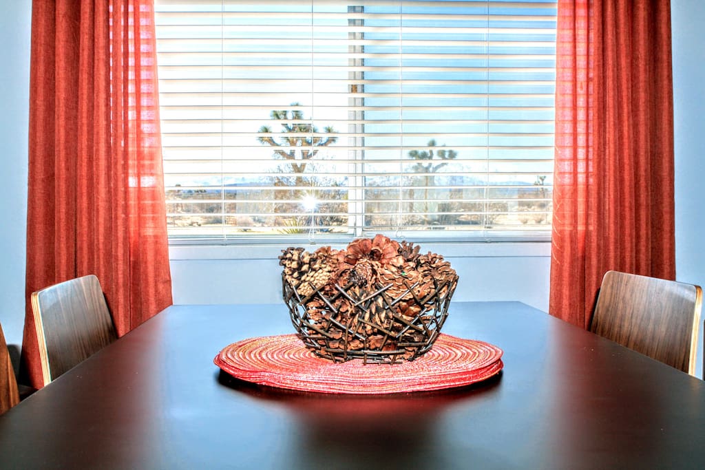 See the San Bernardino Mountains and Joshua Trees from the dining room table.