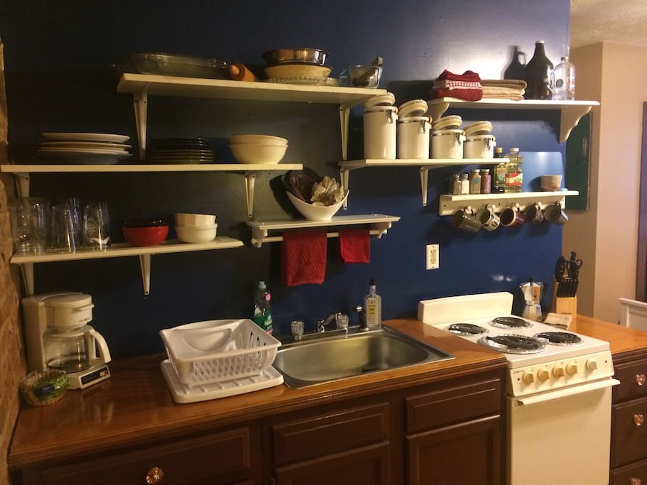 Full kitchen stocked with your cooking necessities. Full size fridge, coffee maker, stove/oven, pots & pans, etc.