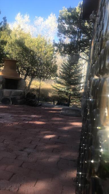 Front porch with little chiminea and wood bbq grill. Perfect for a relaxing evening under the stars or a nice meal outdoors.