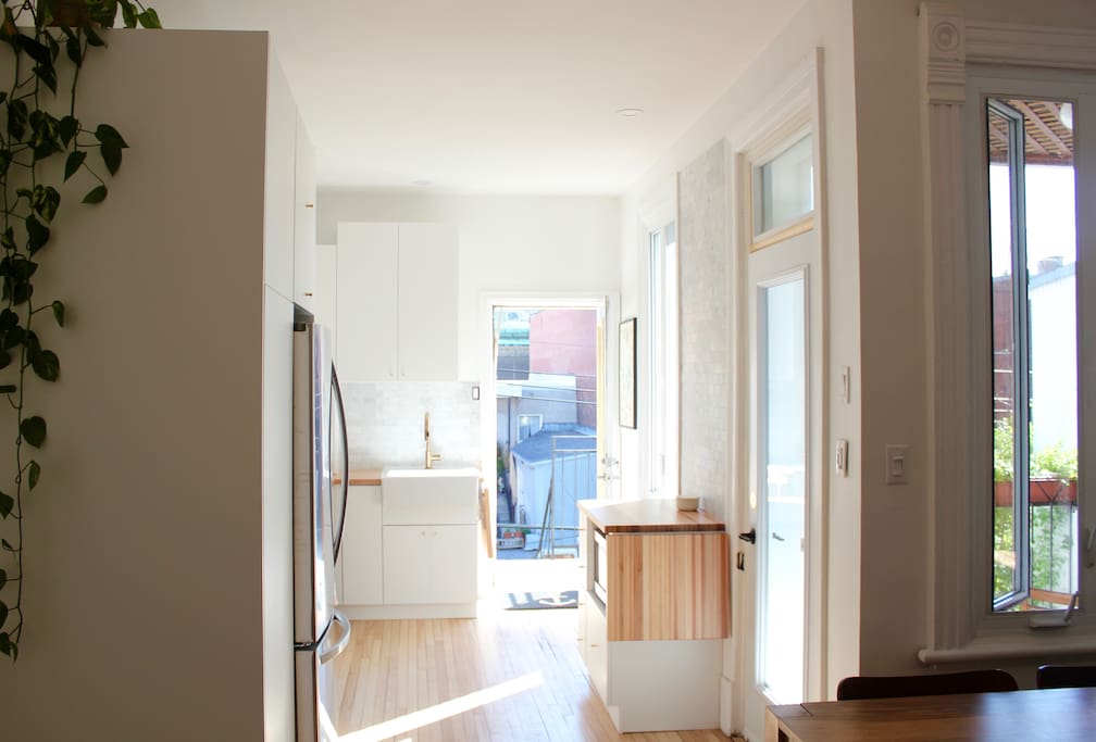 Bright & sunny kitchen with two balconies