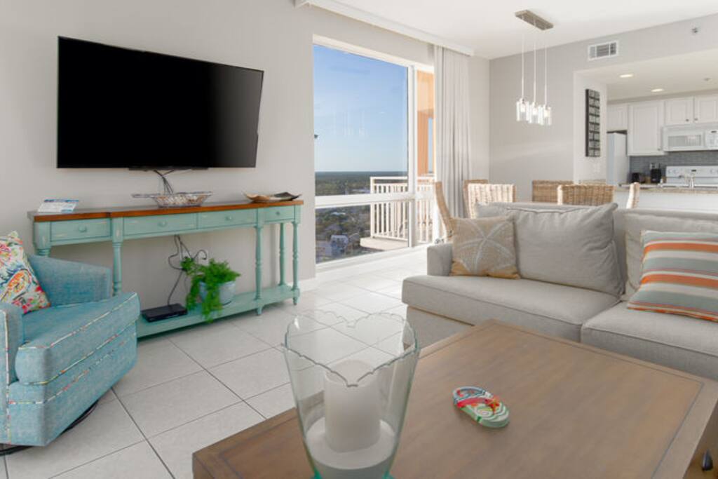Open and bright, this beachfront condo is perfect for entertaining