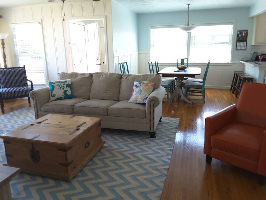 Living room and dinning area. Sofa folds out to a queen size bed.
