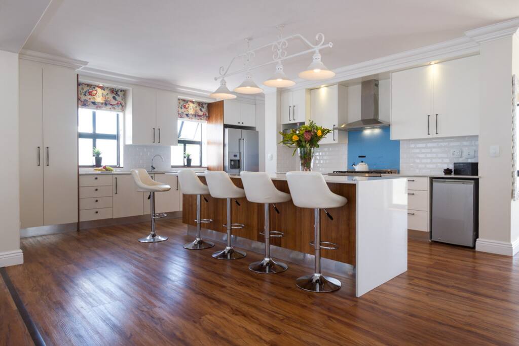 Kitchen with gas stove and electric oven