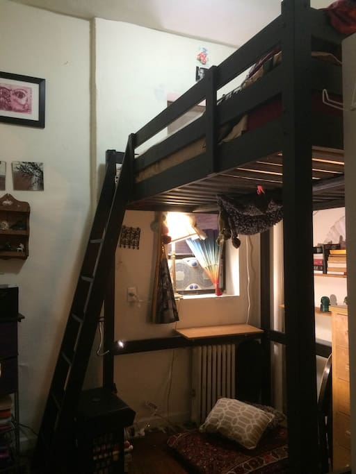 cozy bedroom with full-size loft bed