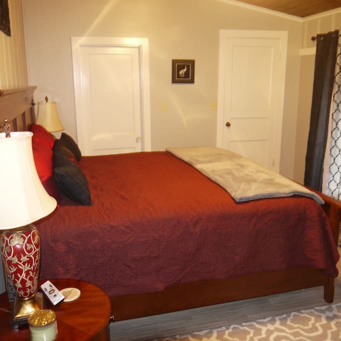 Large room with a full size closet and private bath.