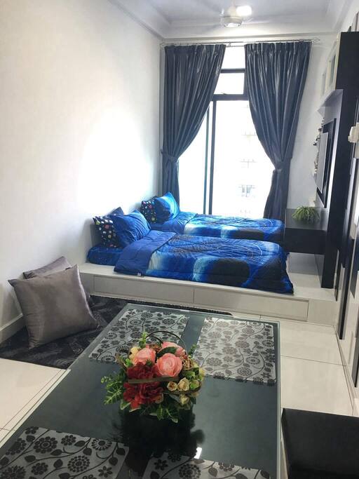 Bedroom with seating area.