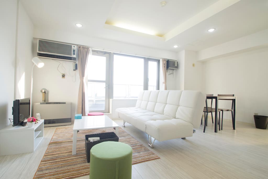 Sofa bed and dining table in living room