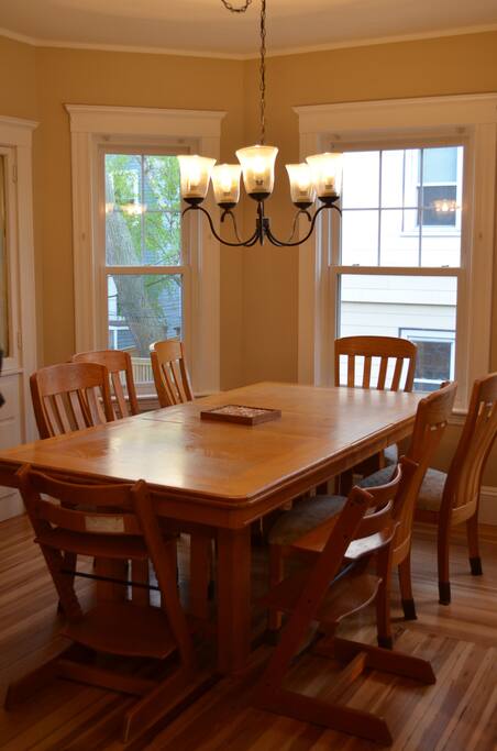 The dining room table can seat 8-10 people.